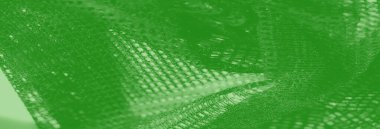 Görüntü, parıldayan parlak ışıklar, yumuşak kıvrımlar ve karmaşık kafes benzeri desenlerle süslenmiş zarif ve sofistike bir ağ kumaşı..