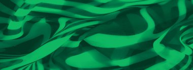 Kalın çizgili ve organik dalga benzeri desenleri olan zarif yeşil bir kumaş. Karmaşık kıvrımlar derinlik katarak sanatsal ve modern bir görsel etki yaratıyor..