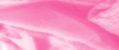 Hassas kıvrımları olan açık pembe tekstil bulanıklığı, ince bir doku sergiliyor. Yumuşak, pürüzsüz kumaş yumuşaklık ve sükuneti çağrıştırıyor, davetkar ve romantik bir görsel cazibe yaratıyor..