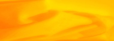 Yumuşak, akan kıvrımları olan bulanık sarı kumaş. Canlı dokusu sıcaklık ve yaratıcılık yayar, modern arka planlar ve dekoratif temalar için idealdir..