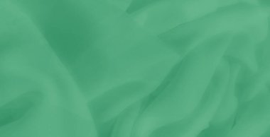 Pürüzsüz, akıcı katmanlı bulanık pastel yeşil kumaş, sakin ve rahatlatıcı bir görsel doku sunuyor. Yumuşak arka planlar, tekstil sanatı veya yaratıcı projeler için harika..