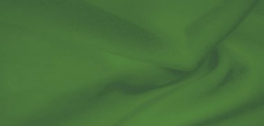 Yeşil kumaştan bir bulanıklık, lüks bir kumaş ve akan kıvrımlar. Yumuşak malzeme ve canlı renk, zenginlik ve zarafet katarak arka plan olarak kullanımını artırır..
