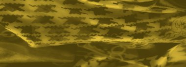 Görüntü, dinamik zincir ve zikzak desenli parlak sarı bir kumaş ortaya çıkarır. Geleneksel motifleri cesur, çağdaş bir cazibe ve karmaşık detaylarla harmanlar..