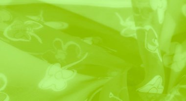 Bulanık yeşil kumaş çiçek desenleri ve ışık çizgileriyle süslenmiş. Katlama ve şeffaflık etkileşimi derinlik katlar, modern yaratıcı dekor için mükemmeldir..