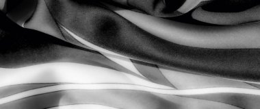 Görüntü - Bu gri ölçekli kumaş görüntüsü, ince kıvrımlar ve açık-koyu zıtlıklarla, görsel projelere doku eklemek için mükemmeldir. Zarif tek renkli tonlar modern ve zarif çekiciliğini arttırır..