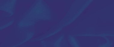 Karmaşık kıvrımları ve akış çizgileri olan koyu mavi kumaşın bulanık kompozisyonu. Pürüzsüz dokusu tasarım projeleri için zarif ve görsel bir zemin oluşturur..