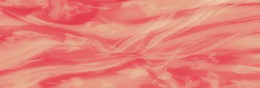 Hassas beyaz çiçek motifleriyle süslenmiş yumuşak mercan-pembe kumaş bulanıklığı moda ve iç tasarım kavramları için ideal akıcı ve romantik bir doku yaratıyor.