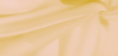 Yumuşak dalgalı narin sarı kumaş bulanıklığı zarif ve minimal bir zemin sağlar. Soyut tasarımlar ve estetik görüntüler için mükemmel..