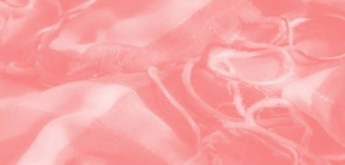 Katmanlı dokuları, yıpranmış detayları ve parıldayan aksanları olan bulanık pembe kumaş yumuşak, pastel estetik ve zarif sanatsal kaliteyi sunar..