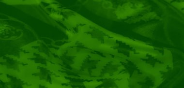 Görüntü, karmaşık houndstooth desenleri ve zincir benzeri aksanları olan yeşil bir kumaş yakalıyor. Tasarım ve tekstil projeleri için ideal canlı ama yumuşak bir doku sunuyor..