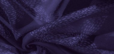 Belirsiz örtüşen desenleri ve yumuşak akışkan dokusu olan bulanık mor kumaş. Derin mor renk gizemli ve lüks bir his ekler. Çeşitli projelerde tasarım elementleri için idealdir.