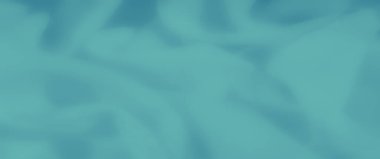 İnce kumaşlı bulanık su kumaşı. Huzurlu ve minimalist bir titreşim uyandırıyor. Arkaplan, sanatsal kompozisyon veya tekstil tasarımı için ideal..