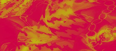 Canlı sarı ve kırmızı soyut kumaş, karmaşık çiçekli ve geometrik desenli, dinamik ve canlı bir bileşim oluşturuyor. Tasarım dokuyu ve hareketi vurgular..