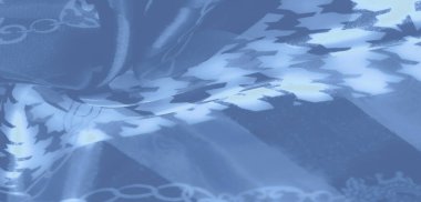 Görüntü: Zigzag desenli ve akışkan şekilli dokulu mavi kumaş. Işığın ve gölgenin yumuşak etkileşimi bu sanatsal tekstil tasarımına derinlik katar.