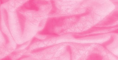 Yumuşak, katmanlı ve yumuşak dokuları olan bulanık pembe kumaş. Pastel renk ve ışık malzemesi rahatlatıcı ve hassas bir dokunuş ekler, yaratıcı projeler için mükemmel bir zemin oluşturur..