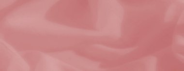 Bulanık pastel pembe kumaş ince, akışkan kıvrımlarla sanat, tekstil fotoğrafçılığı ve yaratıcı tasarımlar için ideal ruhani ve romantik bir atmosfer yaratır.