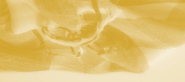 Pürüzsüz, akıcı kıvrımlı ve ince şeffaflığı olan canlı sarı dokuyu bulanıklaştırmak, yaratıcı ve tasarım kullanımı için ideal, yumuşak ve parlak bir estetik yaratır..