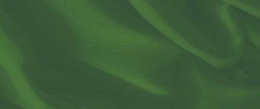 Yumuşak, akıcı kıvrımlı yeşil kumaş ve zengin tonlarda bulanıklık, dingin ve pürüzsüz bir doku yaratıyor. Tekstil tasarımı ya da soyut sanatsal arkaplan olarak mükemmel.