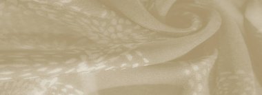 Hafif bej kumaştan bulanık, narin kıvrımları ve çiçeğe benzer desenleri var. Zarif, minimalist tekstil uygulamaları için ideal katmanlı bir görünüm sağlıyor..