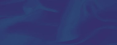 Derin lacivert kumaş, ince kıvrımları ve ince bir dokusu var, minimalist ve sofistike tasarım geçmişi için mükemmel..