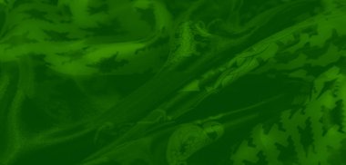 Görüntü, karmaşık houndstooth desenleri ve zincir benzeri aksanları olan yeşil bir kumaş yakalıyor. Tasarım ve tekstil projeleri için ideal canlı ama yumuşak bir doku sunuyor..