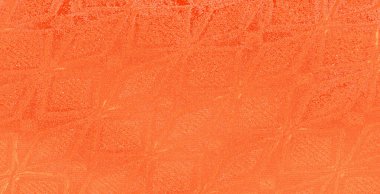 Karmaşık desenli bulanık kumaş zengin turuncu tonda, pürüzsüz bir doku ve parlak gölgeler sergiliyor, soyut bir görünüm yaratıyor..