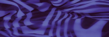Görüntü, çizgili mor kumaşın sanatsal kıvrımlarını ve dokularını inceliyor. Yumuşak kıvrımları ve ışık gölgelerini harmanlıyor. Zarif ve çağdaş bir görsel cazibe için..