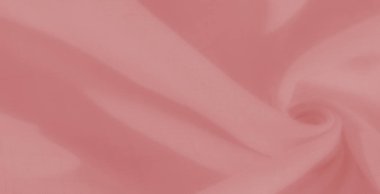 Yumuşak kıvrımlı bulanık pembe kumaş yumuşak bir şekilde akar, rüya gibi ve romantik bir zemin oluşturur, tekstil sanatı veya yaratıcı kompozisyon için mükemmeldir.