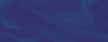 Yumuşak kıvrımlı, pürüzsüz ve soyut bir tasarım yaratan zengin mavi bir tekstil bulanıklığı. İnce doku derinlik ve zarafet ekler, yaratıcı kullanım için mükemmeldir..