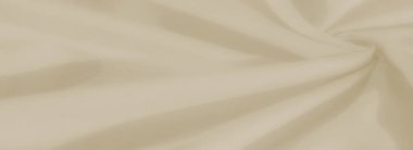 Pürüzsüz yüzeyine derinlik ve doku ekleyerek akan kıvrımları ve yumuşak gölgeleri olan Bulanık Işıklı bej kumaş. Kumaşın zarif çizgileri ve ince gölgelemesi onu zarif bir arkaplan için mükemmel kılıyor..