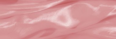 Romantik ve zarif bir estetik, lüks ve sanatsal tasarımlar için ideal, dalgalı bir dokusu olan bulanık pembe kumaş ve parlak renkler..