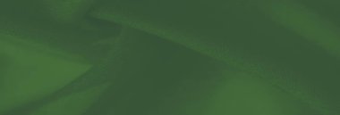 Bulanık yeşil kumaş katmanları zahmetsizce akar, karmaşık dokular ve nazik hareketler ortaya çıkar. Pürüzsüz yüzey uyumlu ve zarif bir dokunuş ekler..