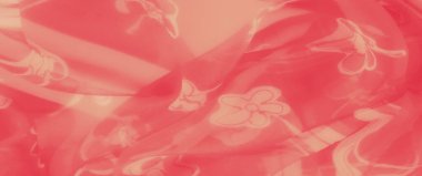 Yumuşak mercan kumaşının bulanık, zarif beyaz çiçek aksanları, taze, sanatsal ve romantik tasarım temaları yaratmak için ideal..