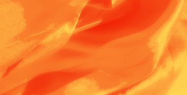 Canlı turuncu kumaş bulanıklığı, parlak gölgeler ve sıvı örtüsü. Parlak saten dokusu ışığı yansıtır ve zengin tonlara derinlik katar..