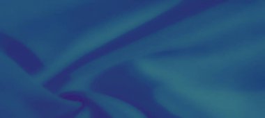 Zarif kıvrımları ve gölge eğimleri olan parlak mavi kumaşın bulanık dokusu zarif görseller için lüks ve pürüzsüz bir yüzey oluşturuyor..