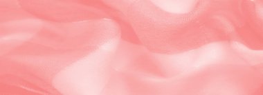 İnce yıpranmış kenarları ve karmaşık dokuları olan mercan kumaş tabakaları, sanatsal altyapı ve tekstil için uygun canlı, ruhani bir kalite sunar..