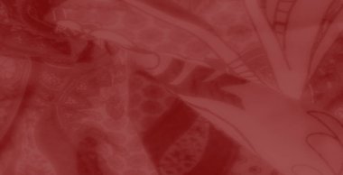 Bulanık detaylar sanatsal girdaplar ve karmaşık tasarımlarla süslenmiş kırmızı bir kumaşı vurgular, lüks, zamansız bir moda ve dekor görünümü yaratır..