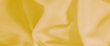 Yumuşak kıvrımları ve hafif dokusu olan pürüzsüz ve dalgalı sarı bir kumaş. Havalı görünüşü zariflik yayar, huzurlu ve sanatsal bir görsel etki yaratır..