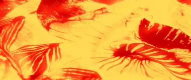 Parlak turuncu ve sarı kumaş sergilenen bulanık dokular kıvrımlar, karmaşık detaylar ve sanatsal projeler ve tasarımlar için mükemmel parıldayan estetik..