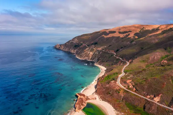 stock image Highway 1 and Big Sur along the Pacific Ocean coast, beautiful landscape and aerial view, sunset, sunrise, fog. Concept, travel, vacation, weekend.