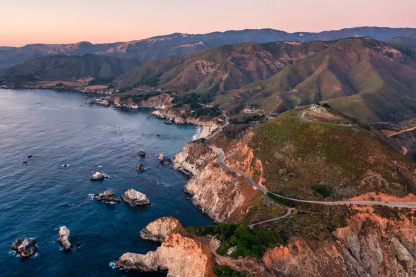 stock image Highway 1 and Big Sur along the Pacific Ocean coast, beautiful landscape and aerial view, sunset, sunrise, fog. Concept, travel, vacation, weekend.