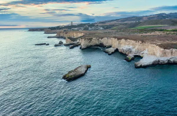 stock image Shark Fin cove on Highway 1 and Big Sur along the Pacific Ocean coast, beautiful landscape and aerial view, sunset, sunrise, fog. Concept, travel, vacation, weekend