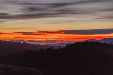 Breathtaking, beautiful sunrise view in mountains Silicon Valley, dreamy backdrop for trekking enthusiasts. Travel moment captures natures harmony and the allure of morning light in California's hills clipart