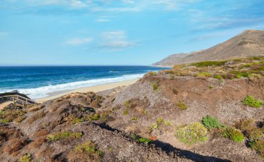 A beautiful view to Malpaso Creek Beach, on the Pacific coast of California along State Road 1 clipart