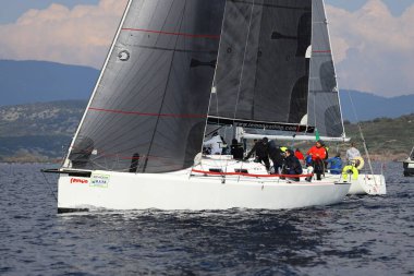 Bodrum,Turkey. 14 January 2023: Sailboats sail in windy weather in the blue waters of the Aegean Sea, on the shores of the famous holiday destination Bodrum.