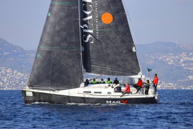 Bodrum,Turkey. 14 January 2023: Sailboats sail in windy weather in the blue waters of the Aegean Sea, on the shores of the famous holiday destination Bodrum.