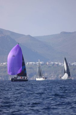 Bodrum,Turkey. 14 January 2023: Sailboats sail in windy weather in the blue waters of the Aegean Sea, on the shores of the famous holiday destination Bodrum.