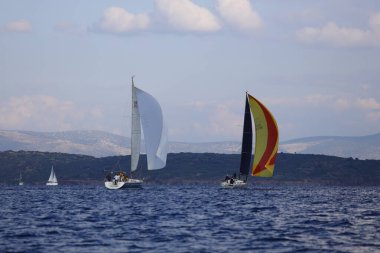 Bodrum,Turkey. 14 January 2023: Sailboats sail in windy weather in the blue waters of the Aegean Sea, on the shores of the famous holiday destination Bodrum.