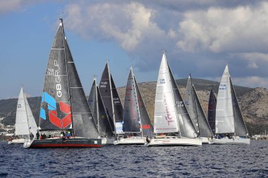 Bodrum,Turkey. 15 January 2023: Sailboats sail in windy weather in the blue waters of the Aegean Sea, on the shores of the famous holiday destination Bodrum.