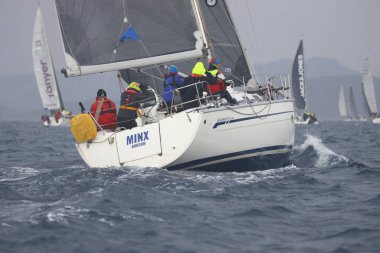 Bodrum,Turkey. 05 February 2023: Sailboats sail in windy weather in the blue waters of the Aegean Sea, on the shores of the famous holiday destination Bodrum.